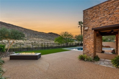 Cradled by the Red Rock Mountains, this exceptional estate on Red Rock Country Club in Nevada - for sale on GolfHomes.com, golf home, golf lot