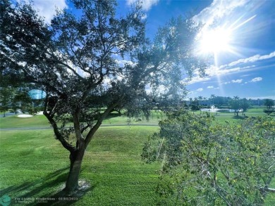 EXPANSIVE GOLF/WATER/CLUBHOUSE VIEW from this Favored LUXURY on Wynmoor Golf Course in Florida - for sale on GolfHomes.com, golf home, golf lot