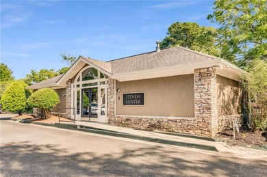 This three-sided brick traditional beauty delivers space, style on Polo Golf and Country Club in Georgia - for sale on GolfHomes.com, golf home, golf lot