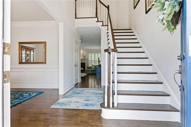 This three-sided brick traditional beauty delivers space, style on Polo Golf and Country Club in Georgia - for sale on GolfHomes.com, golf home, golf lot