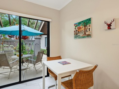 Looking for an updated END-UNIT that feels like home right away on The Meadows Golf and Country Club in Florida - for sale on GolfHomes.com, golf home, golf lot