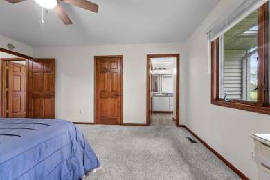 Nestled on the 9th hole of White Deer Country Club, this on White Deer Country Club in Michigan - for sale on GolfHomes.com, golf home, golf lot