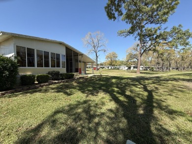Located in Rolling Greens Village, a 55+ community in Ocala on Rolling Greens Executive Golf Community in Florida - for sale on GolfHomes.com, golf home, golf lot
