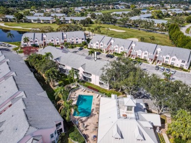 Enjoy the easy life in this first floor unit, mere steps away on The Golf Club of Jupiter in Florida - for sale on GolfHomes.com, golf home, golf lot