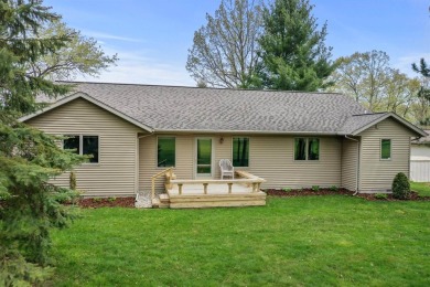 Nestled on the 9th hole of White Deer Country Club, this on White Deer Country Club in Michigan - for sale on GolfHomes.com, golf home, golf lot