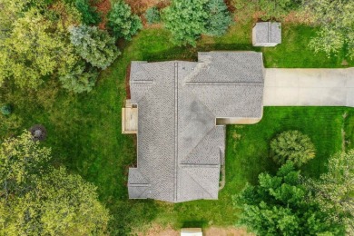 Nestled on the 9th hole of White Deer Country Club, this on White Deer Country Club in Michigan - for sale on GolfHomes.com, golf home, golf lot