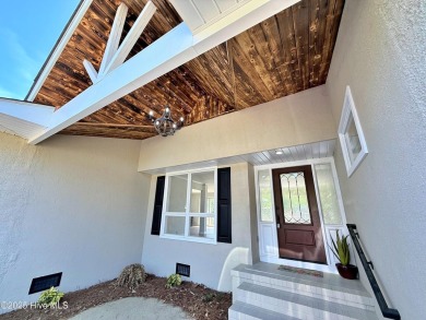 AFFORDABLE, LIKE-NEW WATERFRONT RETREAT WITH UPSCALE TOUCHES!
 on River Bend Golf and Country Club in North Carolina - for sale on GolfHomes.com, golf home, golf lot