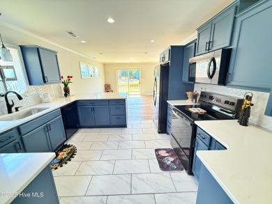 AFFORDABLE, LIKE-NEW WATERFRONT RETREAT WITH UPSCALE TOUCHES!
 on River Bend Golf and Country Club in North Carolina - for sale on GolfHomes.com, golf home, golf lot