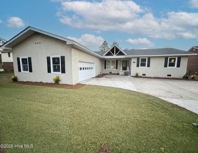 AFFORDABLE, LIKE-NEW WATERFRONT RETREAT WITH UPSCALE TOUCHES!
 on River Bend Golf and Country Club in North Carolina - for sale on GolfHomes.com, golf home, golf lot