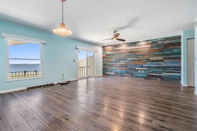 SPECTACULAR SUNSETS, GULF BREEZES, DOLPHINS AND ROSETTA on The Dunedin Country Club in Florida - for sale on GolfHomes.com, golf home, golf lot