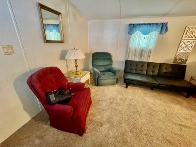 Welcome home to this 1994 single wide manufactured home, which on Golden Lakes Golf Course in Florida - for sale on GolfHomes.com, golf home, golf lot