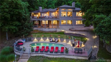 Unparalleled luxury and privacy with this beautifully remodeled on The Club At Porto Cima in Missouri - for sale on GolfHomes.com, golf home, golf lot