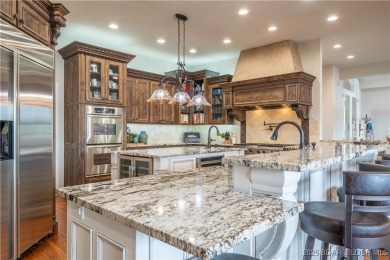 Unparalleled luxury and privacy with this beautifully remodeled on The Club At Porto Cima in Missouri - for sale on GolfHomes.com, golf home, golf lot