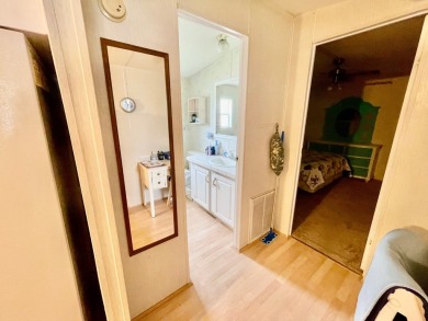 Welcome home to this 1994 single wide manufactured home, which on Golden Lakes Golf Course in Florida - for sale on GolfHomes.com, golf home, golf lot