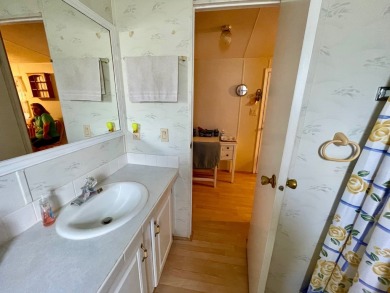 Welcome home to this 1994 single wide manufactured home, which on Golden Lakes Golf Course in Florida - for sale on GolfHomes.com, golf home, golf lot