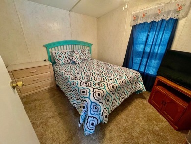 Welcome home to this 1994 single wide manufactured home, which on Golden Lakes Golf Course in Florida - for sale on GolfHomes.com, golf home, golf lot