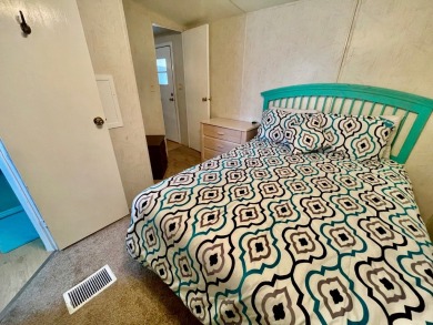 Welcome home to this 1994 single wide manufactured home, which on Golden Lakes Golf Course in Florida - for sale on GolfHomes.com, golf home, golf lot