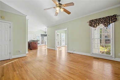 Tucked away on a quiet, double cul-de-sac street is the stately on Brookstone Golf and Country Club in Georgia - for sale on GolfHomes.com, golf home, golf lot