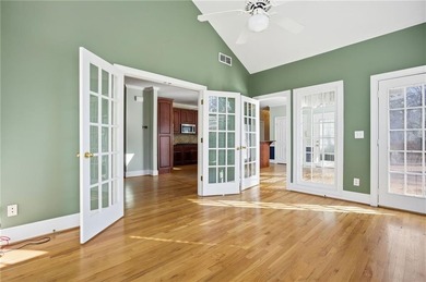 Tucked away on a quiet, double cul-de-sac street is the stately on Brookstone Golf and Country Club in Georgia - for sale on GolfHomes.com, golf home, golf lot