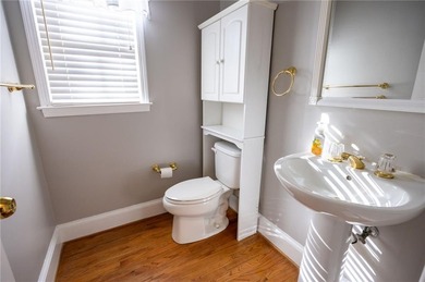 Tucked away on a quiet, double cul-de-sac street is the stately on Brookstone Golf and Country Club in Georgia - for sale on GolfHomes.com, golf home, golf lot