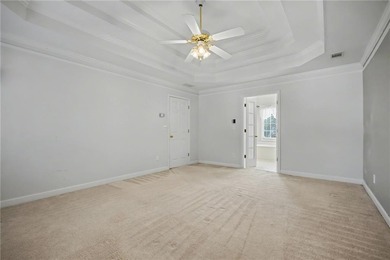 Tucked away on a quiet, double cul-de-sac street is the stately on Brookstone Golf and Country Club in Georgia - for sale on GolfHomes.com, golf home, golf lot