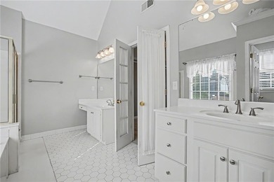 Tucked away on a quiet, double cul-de-sac street is the stately on Brookstone Golf and Country Club in Georgia - for sale on GolfHomes.com, golf home, golf lot