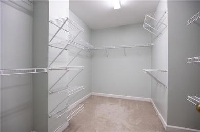 Tucked away on a quiet, double cul-de-sac street is the stately on Brookstone Golf and Country Club in Georgia - for sale on GolfHomes.com, golf home, golf lot