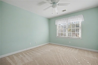 Tucked away on a quiet, double cul-de-sac street is the stately on Brookstone Golf and Country Club in Georgia - for sale on GolfHomes.com, golf home, golf lot