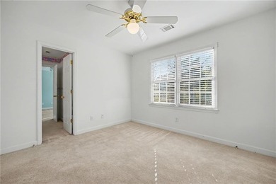 Tucked away on a quiet, double cul-de-sac street is the stately on Brookstone Golf and Country Club in Georgia - for sale on GolfHomes.com, golf home, golf lot