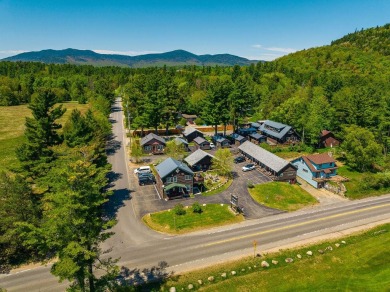 A rare opportunity - Cobble Mountain Lodge is a fully renovated on Lake Placid Resort Golf Club in New York - for sale on GolfHomes.com, golf home, golf lot