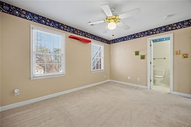 Tucked away on a quiet, double cul-de-sac street is the stately on Brookstone Golf and Country Club in Georgia - for sale on GolfHomes.com, golf home, golf lot