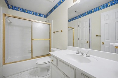 Tucked away on a quiet, double cul-de-sac street is the stately on Brookstone Golf and Country Club in Georgia - for sale on GolfHomes.com, golf home, golf lot