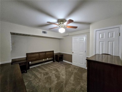 Tucked away on a quiet, double cul-de-sac street is the stately on Brookstone Golf and Country Club in Georgia - for sale on GolfHomes.com, golf home, golf lot