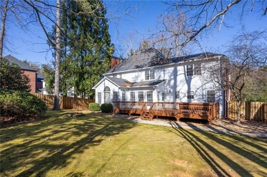 Tucked away on a quiet, double cul-de-sac street is the stately on Brookstone Golf and Country Club in Georgia - for sale on GolfHomes.com, golf home, golf lot