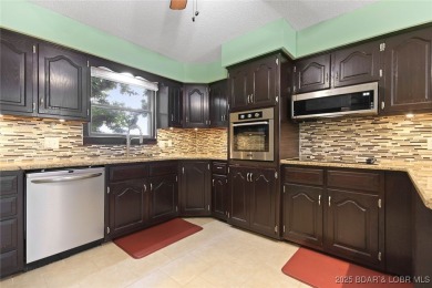 LARGE two bedroom condo that easily sleeps a big family. BIG and on Lake Valley Country Club in Missouri - for sale on GolfHomes.com, golf home, golf lot