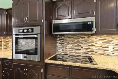 LARGE two bedroom condo that easily sleeps a big family. BIG and on Lake Valley Country Club in Missouri - for sale on GolfHomes.com, golf home, golf lot
