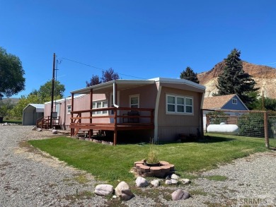 Charming, well-kept home on a nicely landscaped lot in Challis on Challis Golf Course in Idaho - for sale on GolfHomes.com, golf home, golf lot