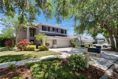 Absolutely gorgeous pool home overlooking a serene pond in the on River Hills Country Club in Florida - for sale on GolfHomes.com, golf home, golf lot