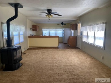 Charming, well-kept home on a nicely landscaped lot in Challis on Challis Golf Course in Idaho - for sale on GolfHomes.com, golf home, golf lot