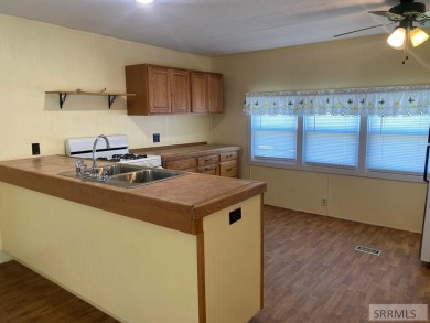 Charming, well-kept home on a nicely landscaped lot in Challis on Challis Golf Course in Idaho - for sale on GolfHomes.com, golf home, golf lot