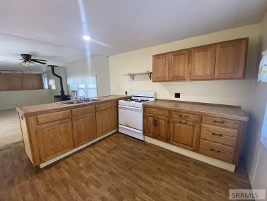 Charming, well-kept home on a nicely landscaped lot in Challis on Challis Golf Course in Idaho - for sale on GolfHomes.com, golf home, golf lot