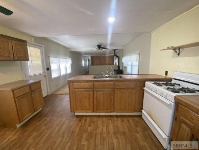 Charming, well-kept home on a nicely landscaped lot in Challis on Challis Golf Course in Idaho - for sale on GolfHomes.com, golf home, golf lot