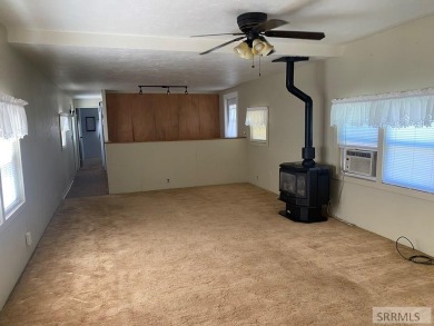 Charming, well-kept home on a nicely landscaped lot in Challis on Challis Golf Course in Idaho - for sale on GolfHomes.com, golf home, golf lot