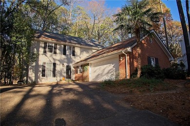 The master and two additional bedrooms are located on the second on Horseshoe Bend Country Club in Georgia - for sale on GolfHomes.com, golf home, golf lot