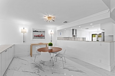 Welcome to this exquisitely re-designed and renovated from on The President Country Club in Florida - for sale on GolfHomes.com, golf home, golf lot