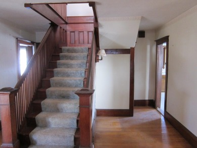 Inviting you~is the wrap around porch and porch swing as you on Derryfield Country Club in New Hampshire - for sale on GolfHomes.com, golf home, golf lot