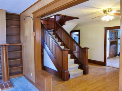 Inviting you~is the wrap around porch and porch swing as you on Derryfield Country Club in New Hampshire - for sale on GolfHomes.com, golf home, golf lot