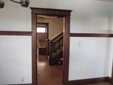 Inviting you~is the wrap around porch and porch swing as you on Derryfield Country Club in New Hampshire - for sale on GolfHomes.com, golf home, golf lot