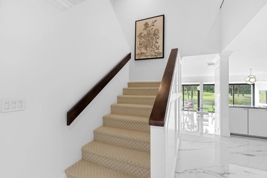 Welcome to this exquisitely re-designed and renovated from on The President Country Club in Florida - for sale on GolfHomes.com, golf home, golf lot