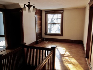 Inviting you~is the wrap around porch and porch swing as you on Derryfield Country Club in New Hampshire - for sale on GolfHomes.com, golf home, golf lot